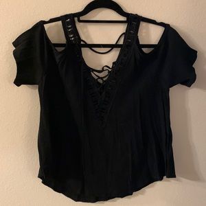 Black tunic with v neck and off the shoulder design